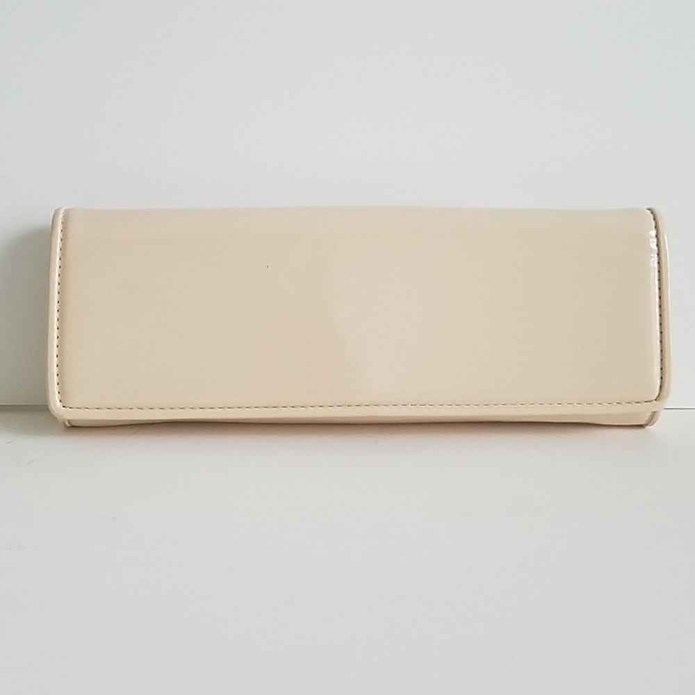 Cream patent leather clutch